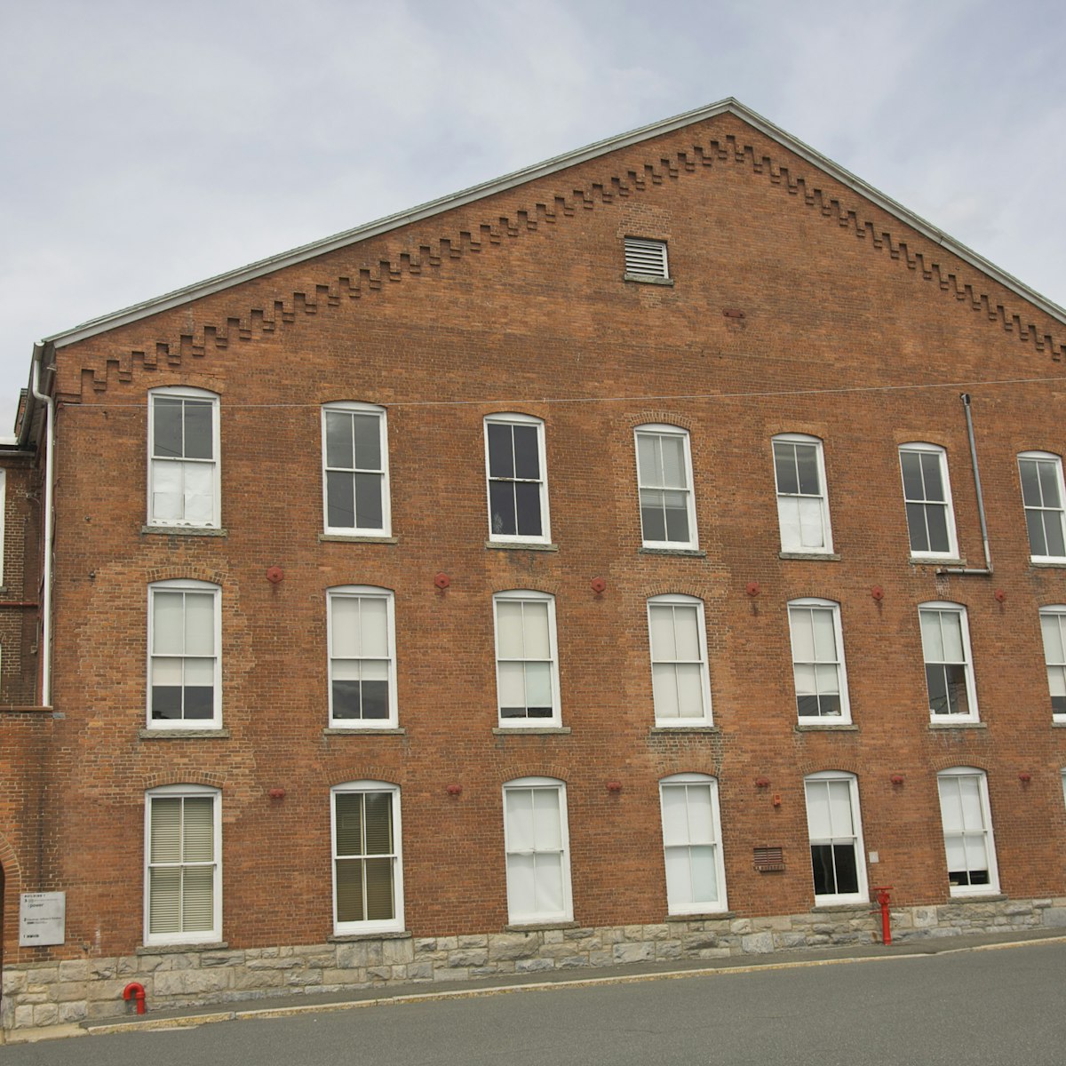 Facade of renovated warehouse building, MASS MoCA, Massachusetts Museum of Contemporary Art, North Adams, The Berkshires, Massachusetts