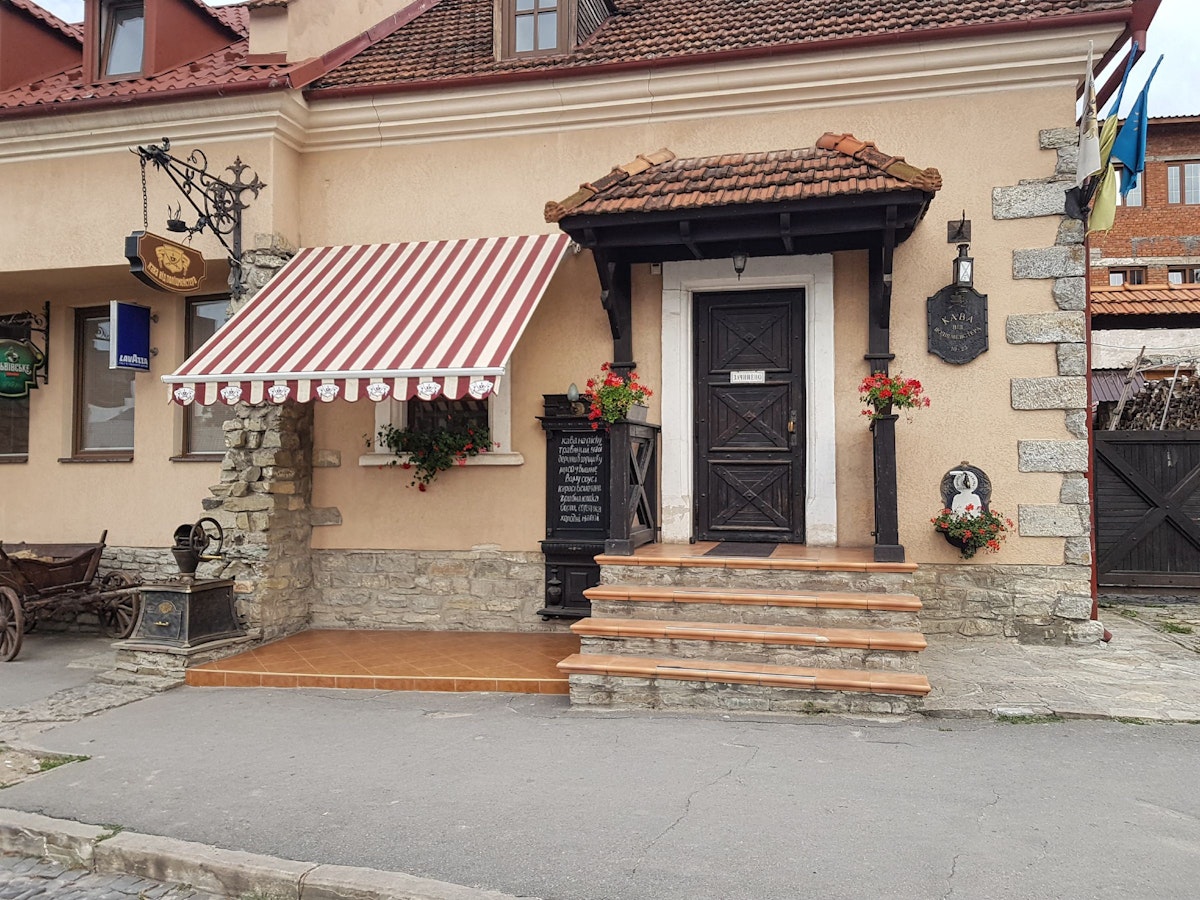 Entrance to Kava Vid Politsmeistera cafe in Kamyanets-Podilsky.