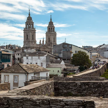 Cathedral and Roman wall of Lugo. Galicia. Spain; Shutterstock ID 583773139; Your name (First / Last): Tom Stainer; GL account no.: 65050 ; Netsuite department name: Online Editorial ; Full Product or Project name including edition: Best in Europe 2017