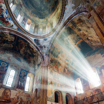 Sunbeams in ornate church window