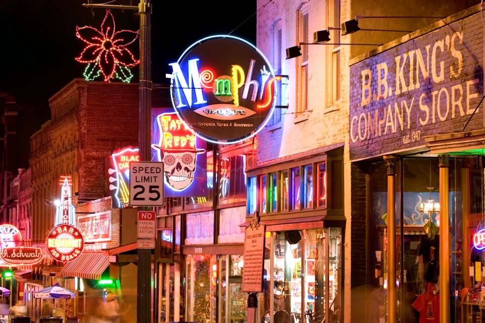 MEMPHIS, USA - NOVEMBER 25: Neon signs of famous blues clubs on historical Beale street on November 25, 2008. Beale street is a major tourist attraction and a place for blues festivals and concerts; Shutterstock ID 128086493; Your name (First / Last): redownload; GL account no.: redownload; Netsuite department name: redownload; Full Product or Project name including edition: redownload