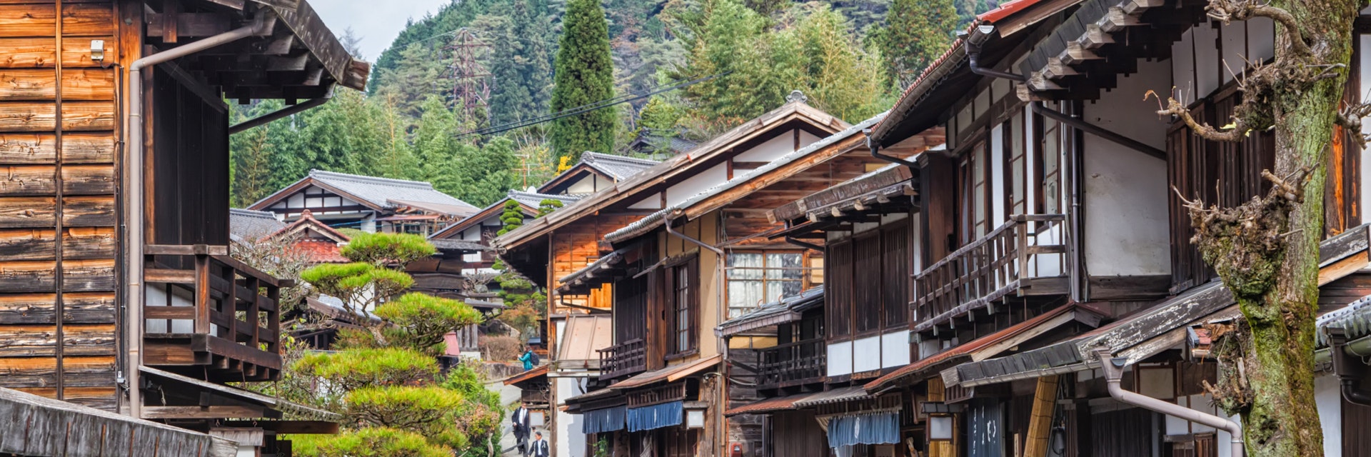TSUMAGO, JAPAN - NOVEMBER 19, 2015: Scenic traditional post town in Japan from Edo period. Famous Nakasendo trail goes between Magome and Tsumago towns.