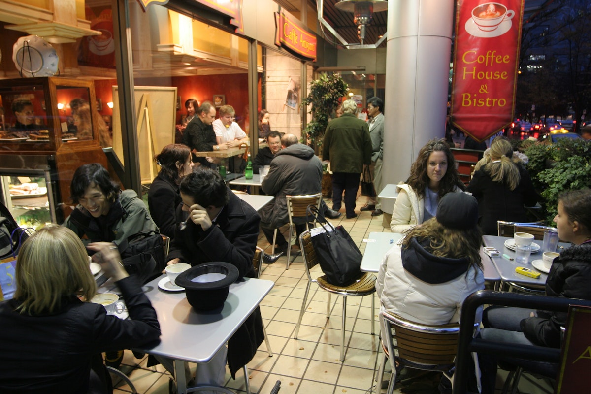 Customers dining at Caffe Artigiano.