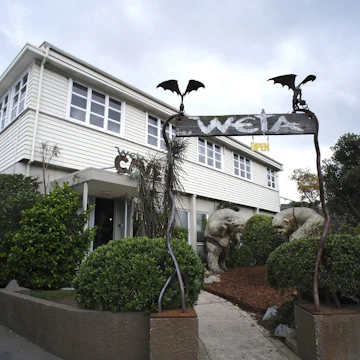 Wellington, New Zealand - August 27, 2013: Front Entrance at Weta Cave; Shutterstock ID 306493316; Your name (First / Last): Lauren Gillmore; GL account no.: 56530; Netsuite department name: Online-Design; Full Product or Project name including edition: 65050/ Online Design /LaurenGillmore/POI