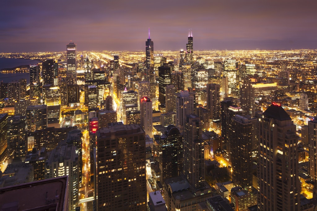 Overview of bright lights of Chicago at night.