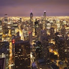 Overview of bright lights of Chicago at night.