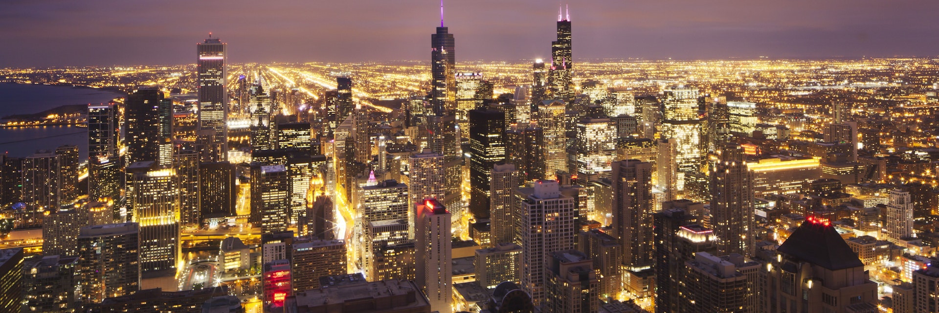 Overview of bright lights of Chicago at night.