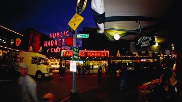 Exterior of Pike Place Market at night.