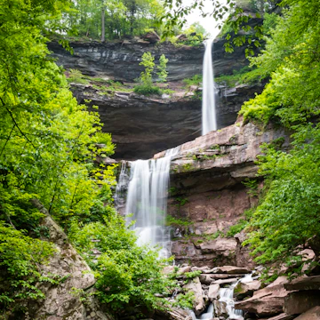 Two-Tier Waterfall surrounded by such green trees in Summer. Kaaterskill Falls taken in the Catskills, NY.