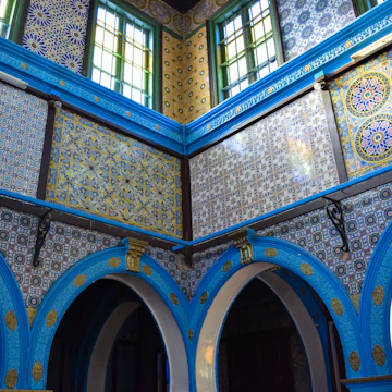 HARA SGHIRA ER RIADH, TUNISIA - JANUARY 3 2017: Ghriba synagogue (Djerba Synagogue). Interior. Hara Seghira (Er-Riadh) jewish village near Houmt Souk town. Tunisia. Northern Africa; Shutterstock ID 694868872; Your name (First / Last): Lauren Keith; GL account no.: 65050; Netsuite department name: Online Editorial; Full Product or Project name including edition: Tunisia Destination Page image update