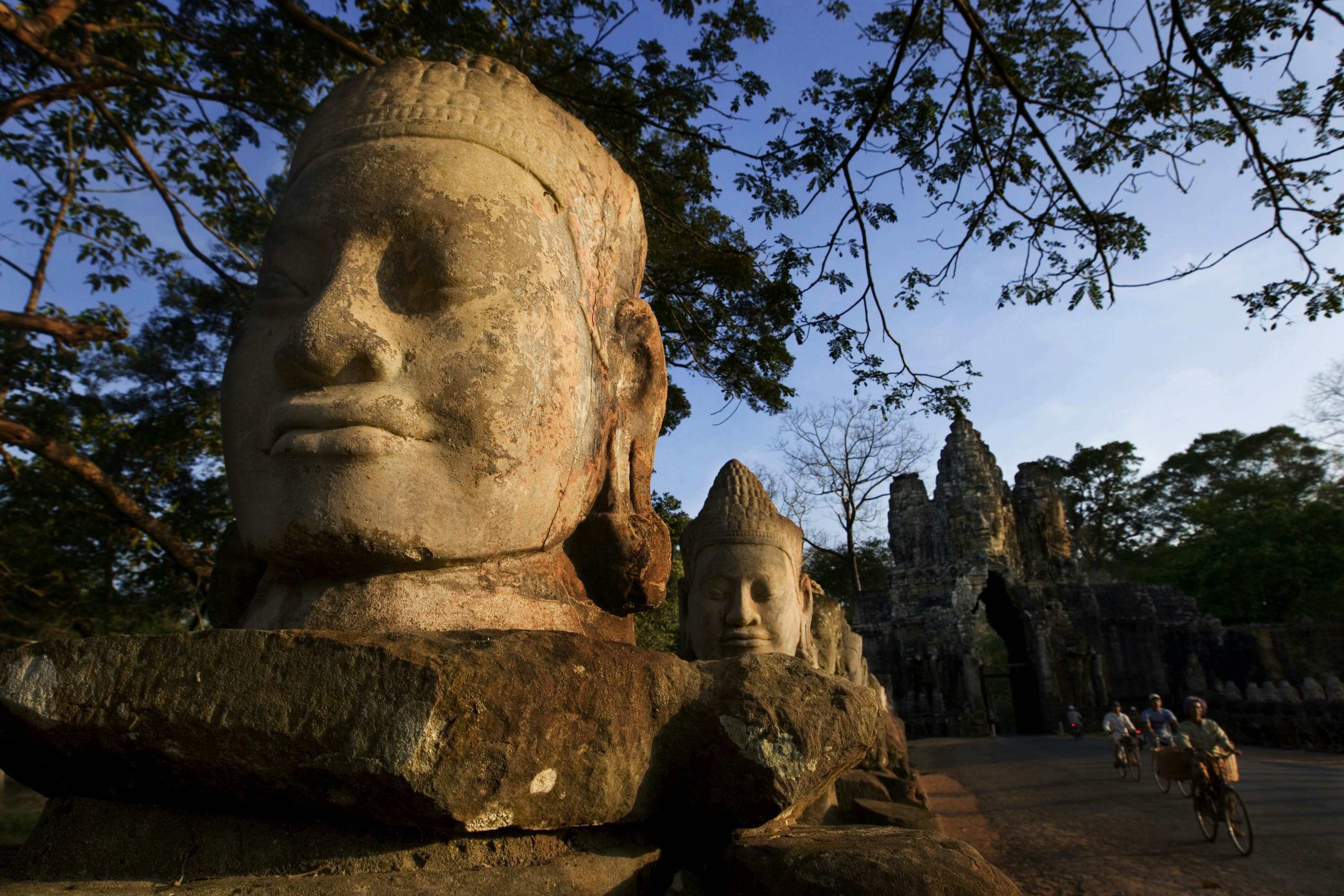 Large head sculpture at South Gate of Angkor Thom.
