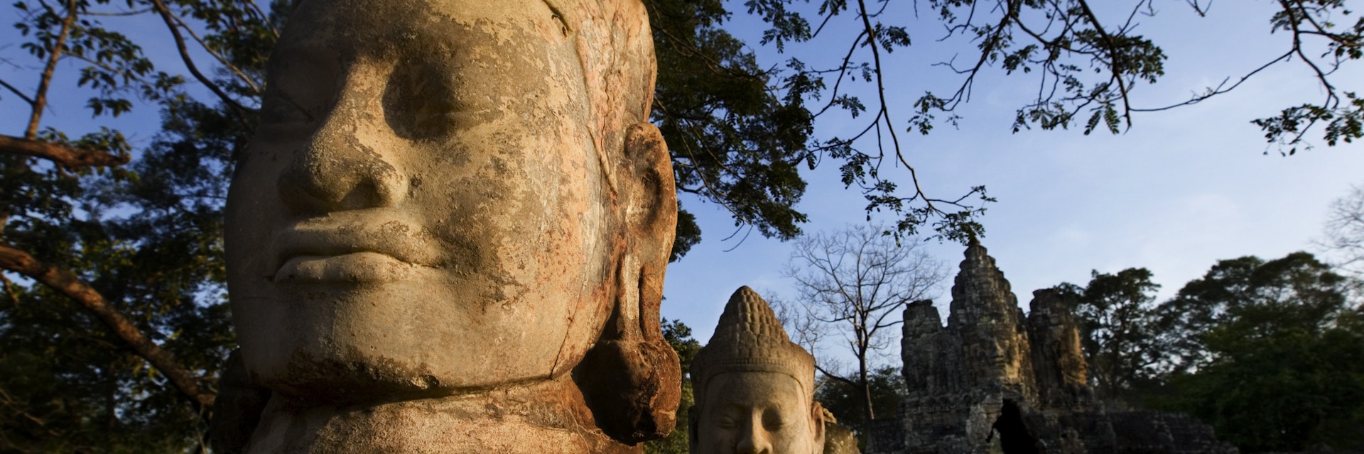 Large head sculpture at South Gate of Angkor Thom.