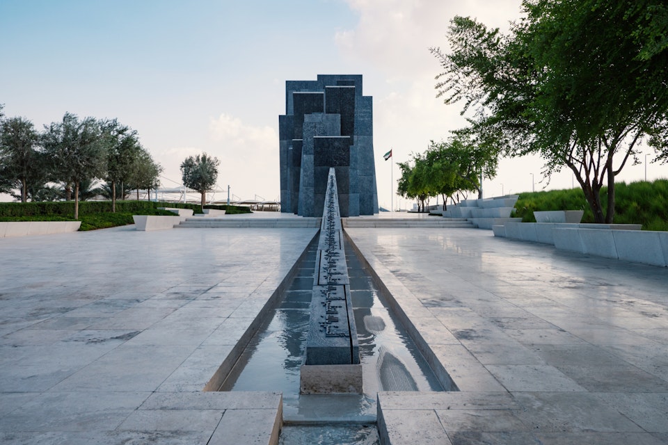 ABU DHABI, UAE - OCTOBER, 2018: Wahat Al Karama (Oasis of Dignity), permanent memorial for its martyrs, and Shaikh Zayed Grand Mosque.; Shutterstock ID 1243074628; Your name (First / Last): Lauren Keith; GL account no.: 65050; Netsuite department name: Online Editorial; Full Product or Project name including edition: Free things Abu Dhabi article