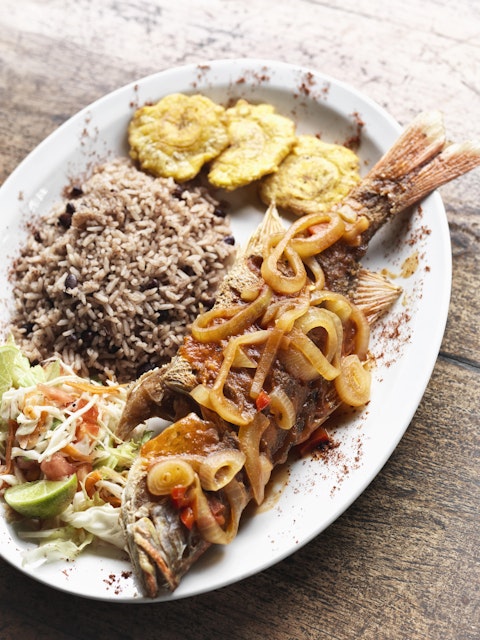 A plate of red snapper and Caribbean rice at Restaurante Elena Brown.