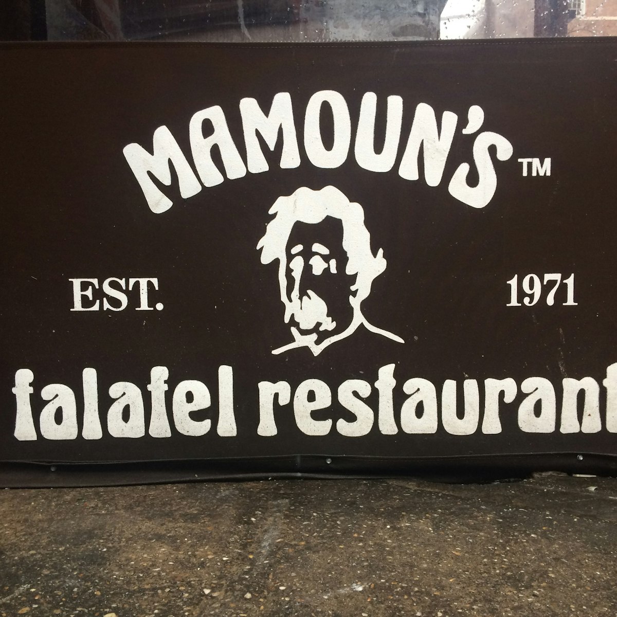 One of the logos outisde of Mamoun's.