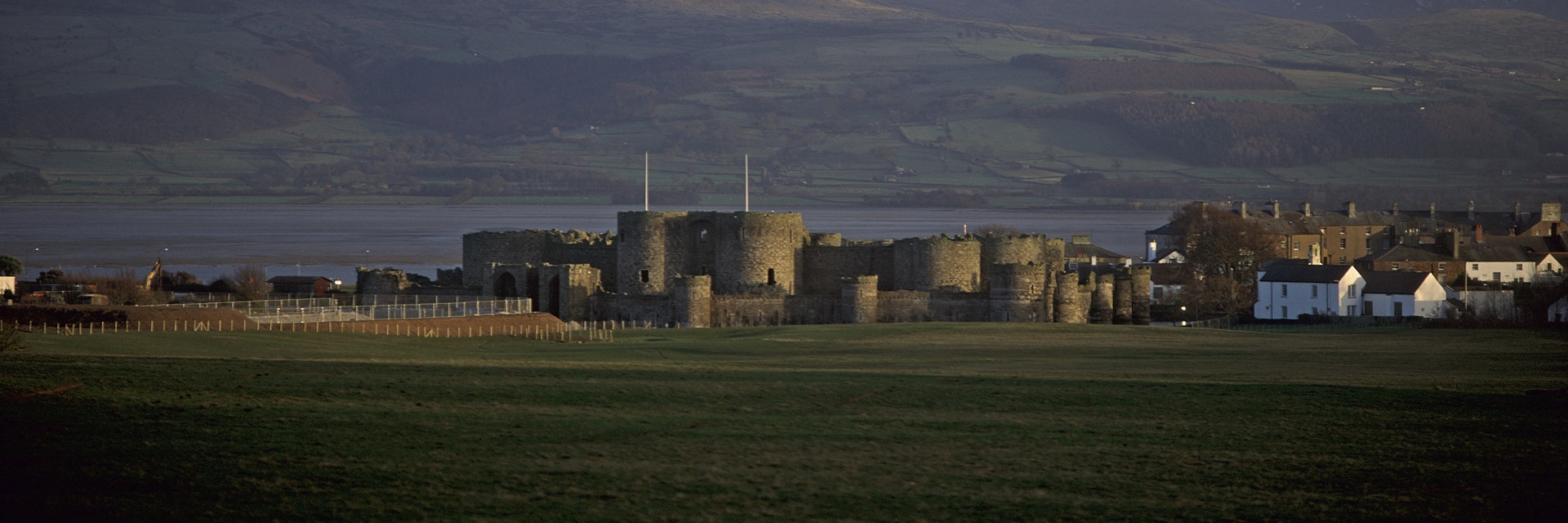 Landscape view of Beaumaris Castle, a World Heritage Site, Beaumaris, Isle of Anglesey, Wales.