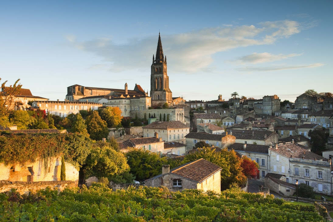 France, Aquitaine Region, Gironde Department, St-Emilion, wine town, town view with Eglise Monolithe church, monring