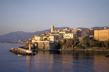 France, Corsica, Bastia, Terra-Nova And The Old Port At Sunrise, The Bell Tower Of Ste-Marie Church (Center Left)