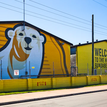 Huge company logo at factory walls of the Bundaberg Rum distillery.