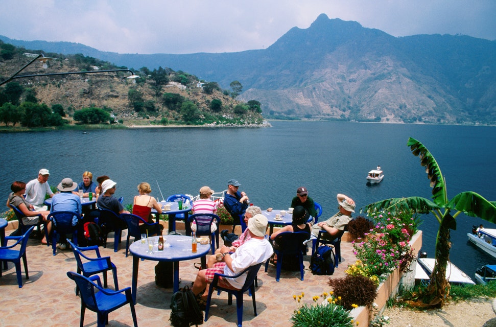Tourists at lakefront cafe, San Pedro la Laguna.