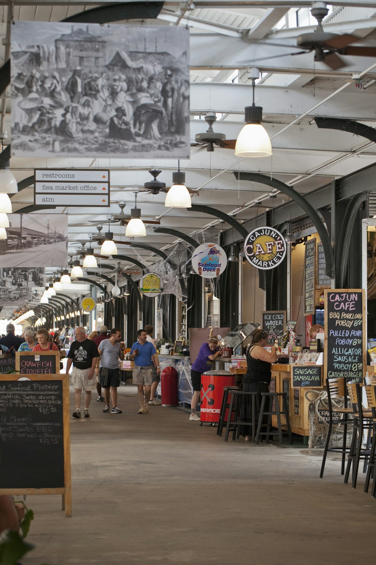 People dining in and strolling through the French Market.