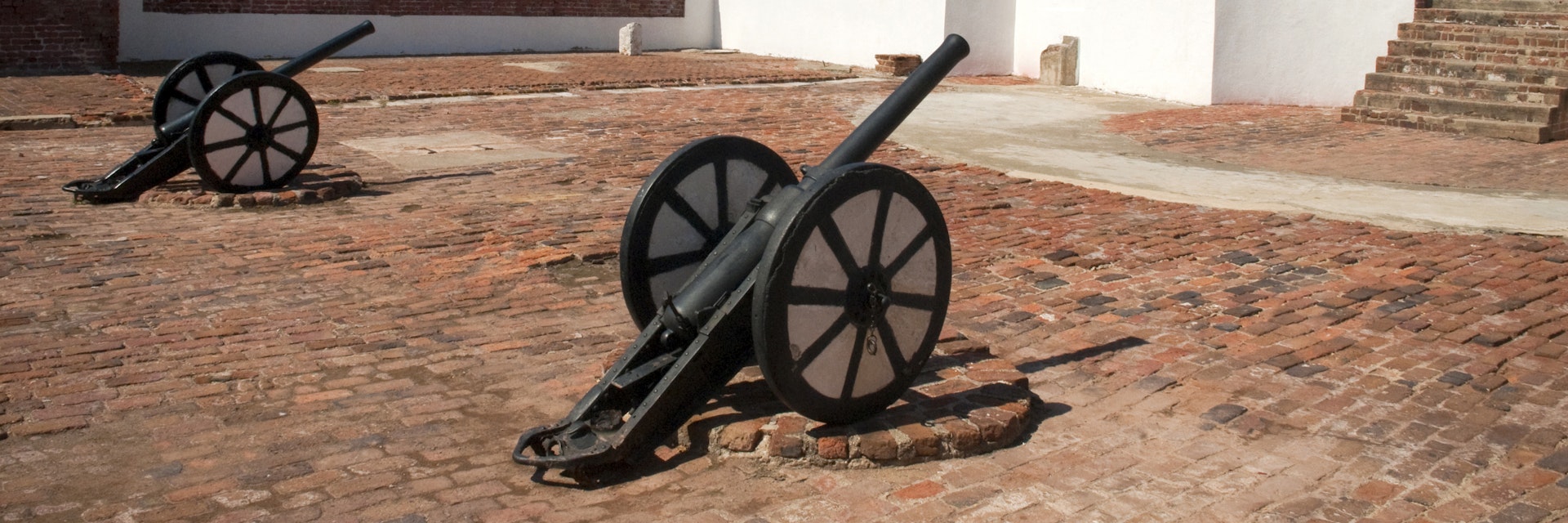 Cannons and tower in courtyard of Fort Charles.