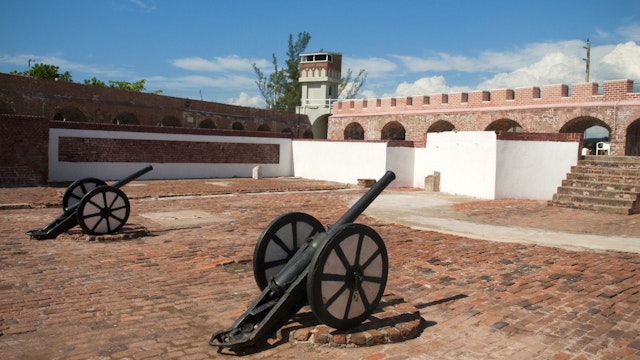 Cannons and tower in courtyard of Fort Charles.