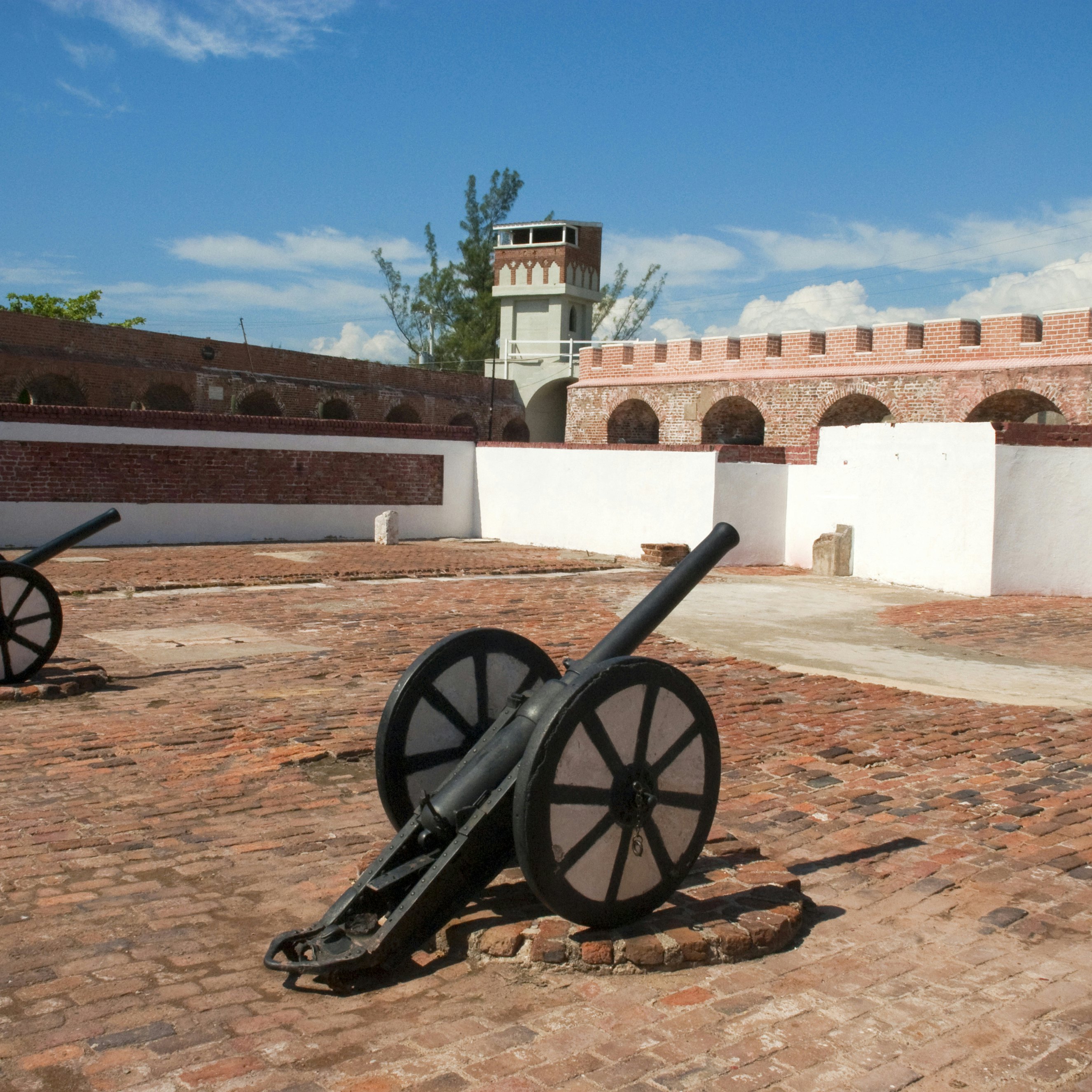 Cannons and tower in courtyard of Fort Charles.