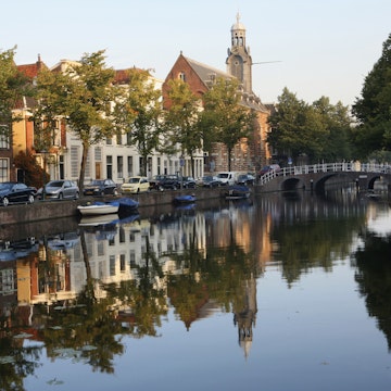 Netherlands, Leiden, view across canal with Leiden university's Academy Building on the right