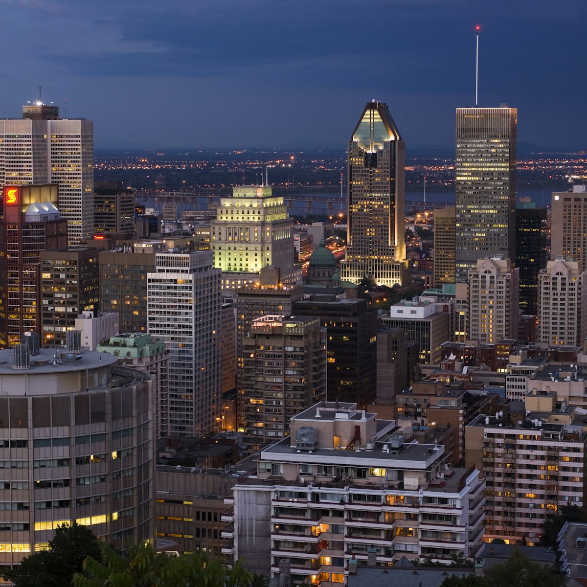 skyline view at twilight from the lookout atop Mt. Royal, Montreal, Quebec, Canada.
