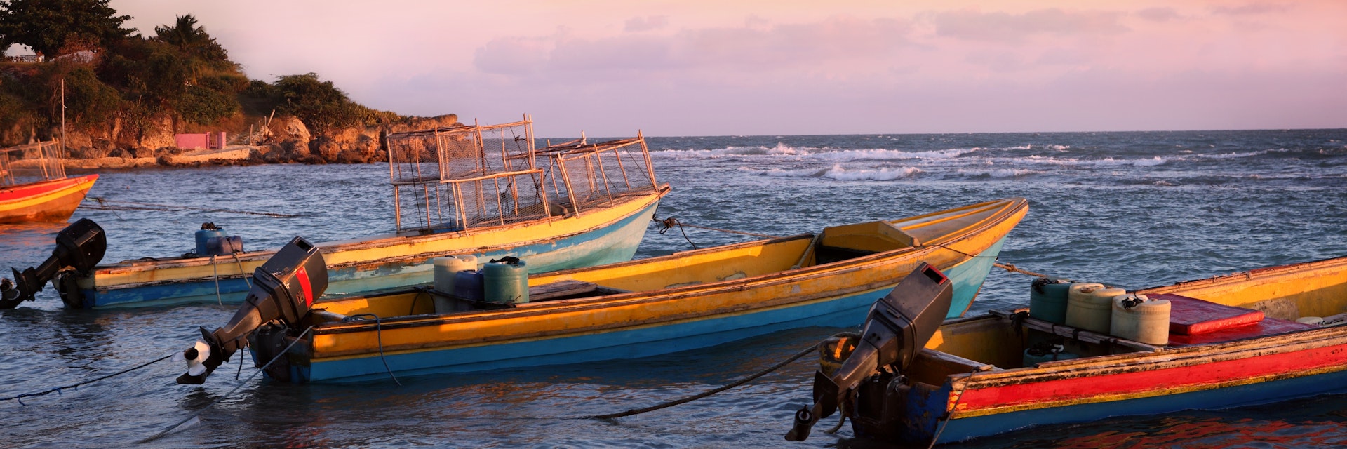 Fishing boats in sunset light