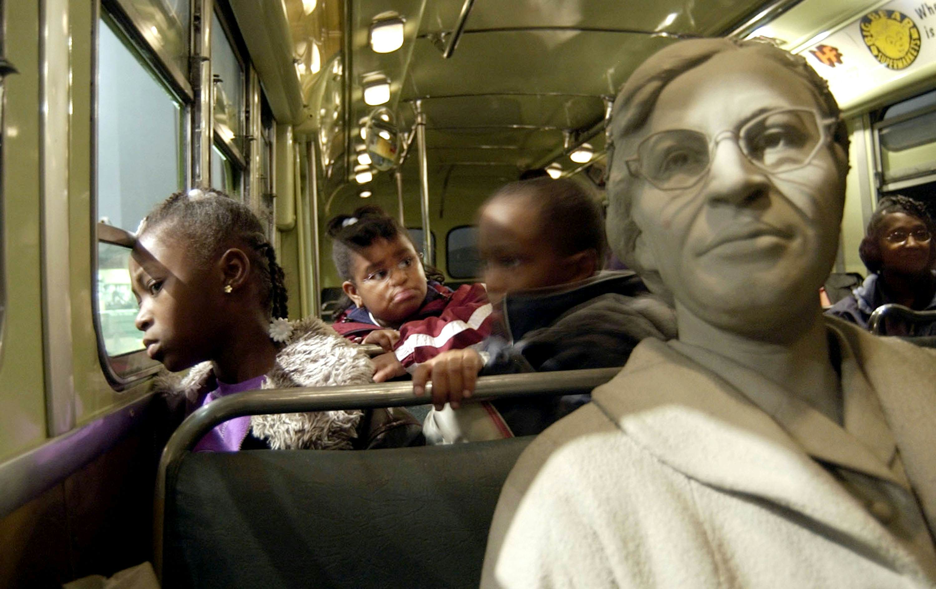 MEMPHIS, TN - JANUARY 19:  Aja Robertson, 7, looks out the window of the Rosa Parks bus exhibit at the National Civil Rights Museum January 19, 2004 in Memphis, Tennessee. The museum's attendance swelled to about 9,500 visitors on Martin Luther King Day.  (Photo by Mike Brown/Getty Images)