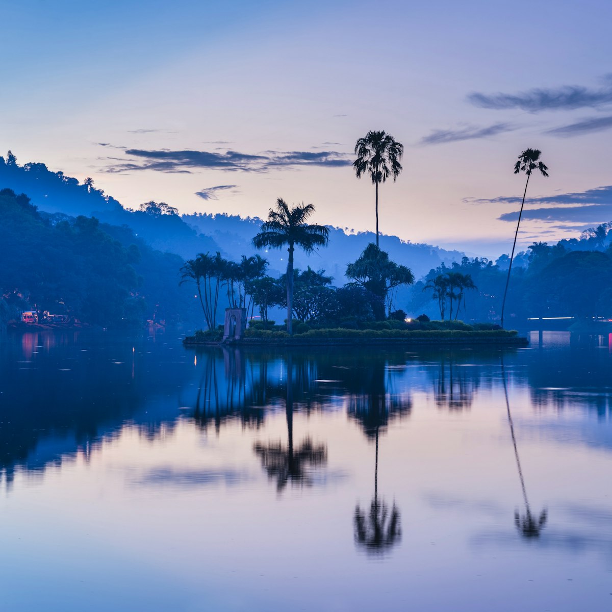 Kandy Lake and the island which houses the Royal Summer House at dawn, Kandy, Central Province, Sri Lanka, Asia