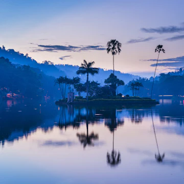 Kandy Lake and the island which houses the Royal Summer House at dawn, Kandy, Central Province, Sri Lanka, Asia