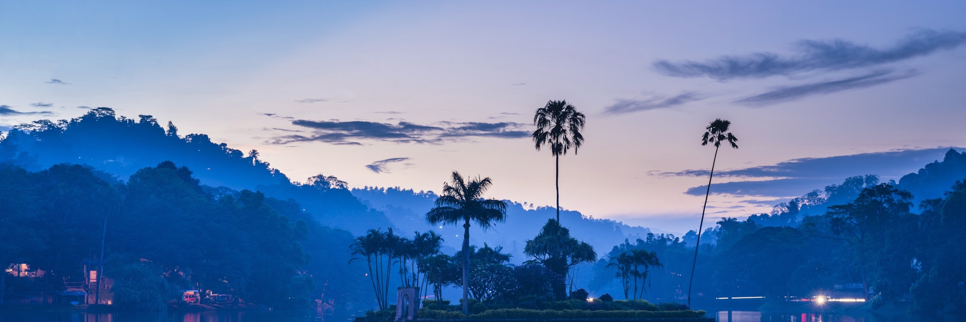 Kandy Lake and the island which houses the Royal Summer House at dawn, Kandy, Central Province, Sri Lanka, Asia