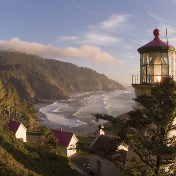 Regal View Heceta Head Lighthouse Shining Across Oregon Coast