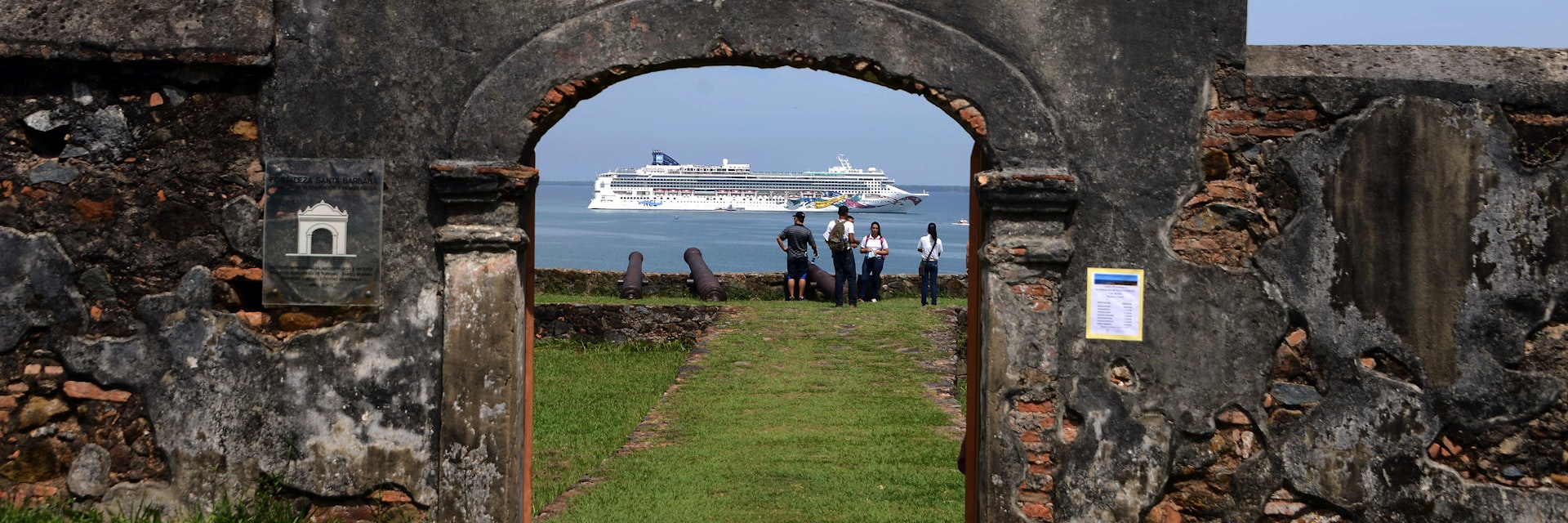 View of a cruise ship through the Santa Barbara fortress while she heads to Trujillo, 600km north of Tegucigalpa on October 15, 2014. AFP PHOTO / Orlando SIERRA (Photo credit should read ORLANDO SIERRA/AFP/Getty Images)
