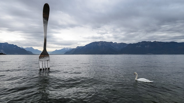 RESTRICTED TO EDITORIAL USE, MANDATORY MENTION OF THE ARTIST UPON PUBLICATION, TO ILLUSTRATE THE EVENT AS SPECIFIED IN THE CAPTION ++ A picture taken on October 17, 2014 in Vevey shows a giant fork designed by Switzerland's artist Jean-Pierre Zaugg to commemorate Nestle's Alimentarium Food Museum 10th anniversary. World's biggest food company, Swiss Nestle Group announced results sales down by 3.1% for the first nine months of 2014 to 66.2 billion Swiss francs (55.1 billion euros).   AFP PHOTO / FABRICE COFFRINI        (Photo credit should read FABRICE COFFRINI/AFP/Getty Images)
