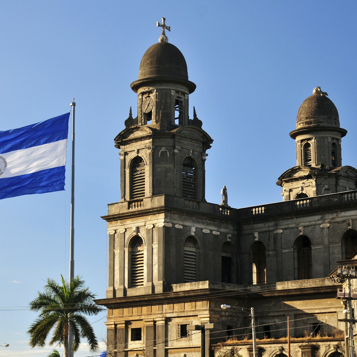 Managua, Nicaragua:  Old Cathedral and Nicaraguan flag