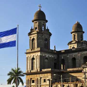 Managua, Nicaragua: Old Cathedral and Nicaraguan flag