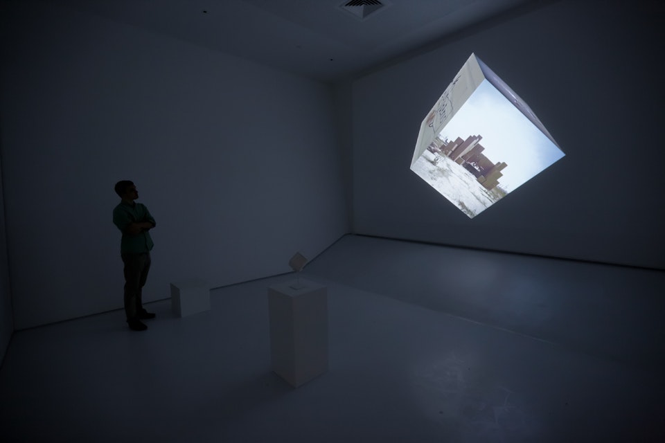 NEW YORK, NY - APRIL 14:  A preview attendee explores an interactive film exhibit entitled "Google Cube-Untitled" during the Sensory Stories Press Preview held at the Museum of the Moving Image on April 14, 2015 in New York City.  (Photo by Brent N. Clarke/Getty Images)