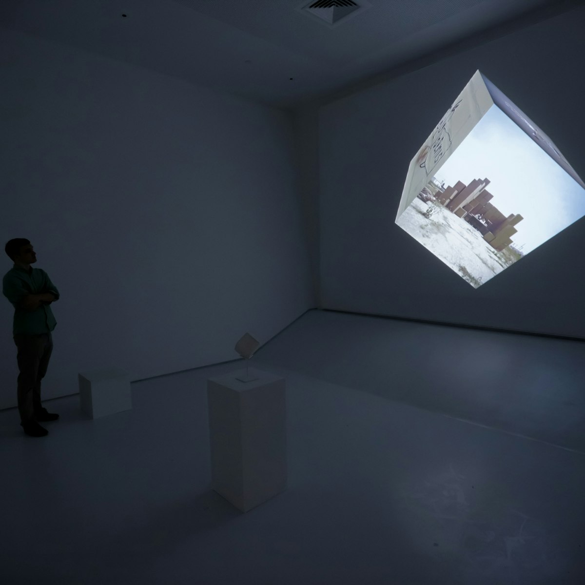 NEW YORK, NY - APRIL 14:  A preview attendee explores an interactive film exhibit entitled "Google Cube-Untitled" during the Sensory Stories Press Preview held at the Museum of the Moving Image on April 14, 2015 in New York City.  (Photo by Brent N. Clarke/Getty Images)