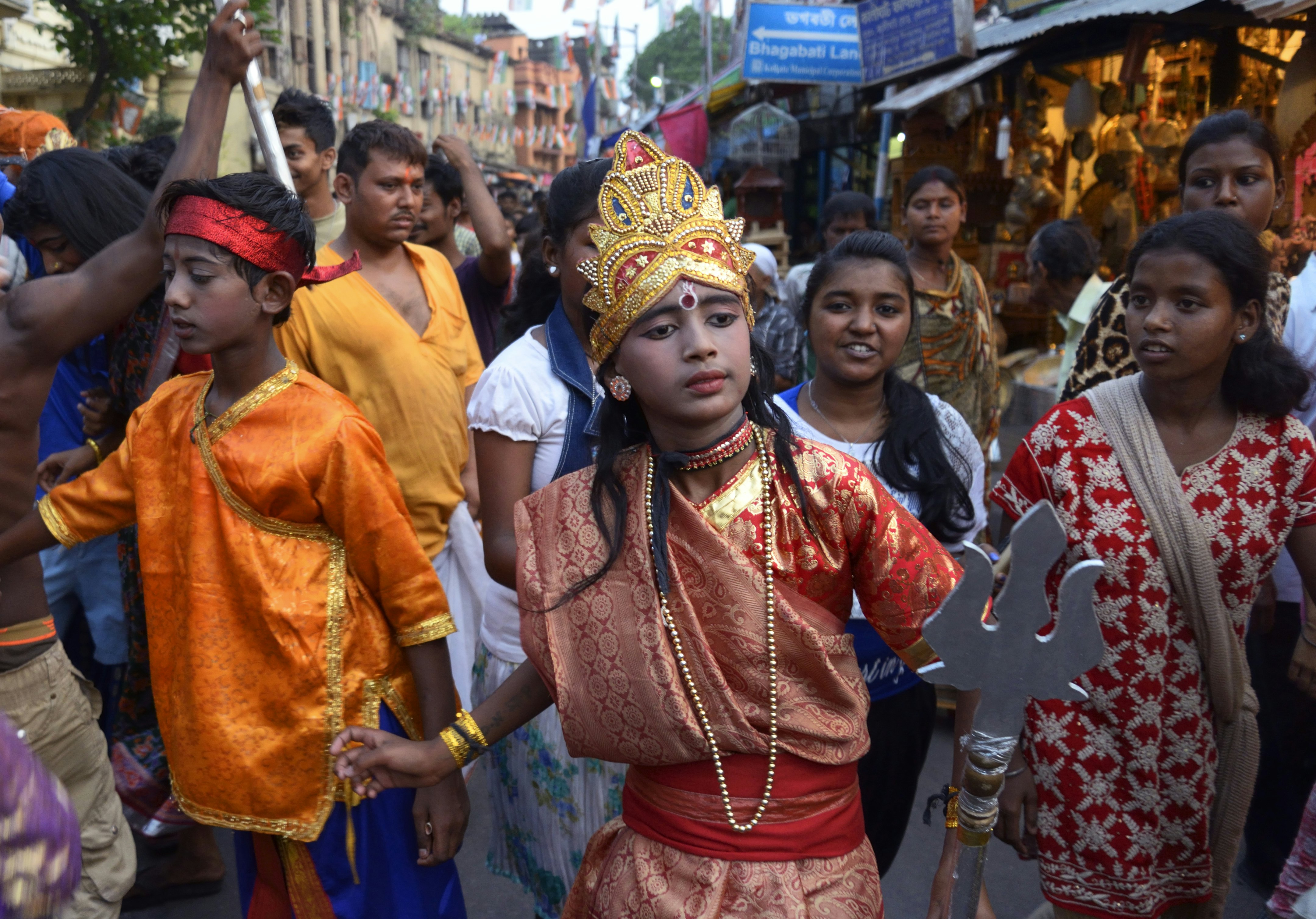 KOLKATA, INDIA - 2015/04/17: On the evening of Chaitra Sankranti the last day of Bengali calendar resident of Kalighat dress up like Hindu deities popularly known as Sang (Pantomime ) for a procession in the surrounding of Kalighat Temple. (Photo by Saikat Paul/Pacific Press/LightRocket via Getty Images)