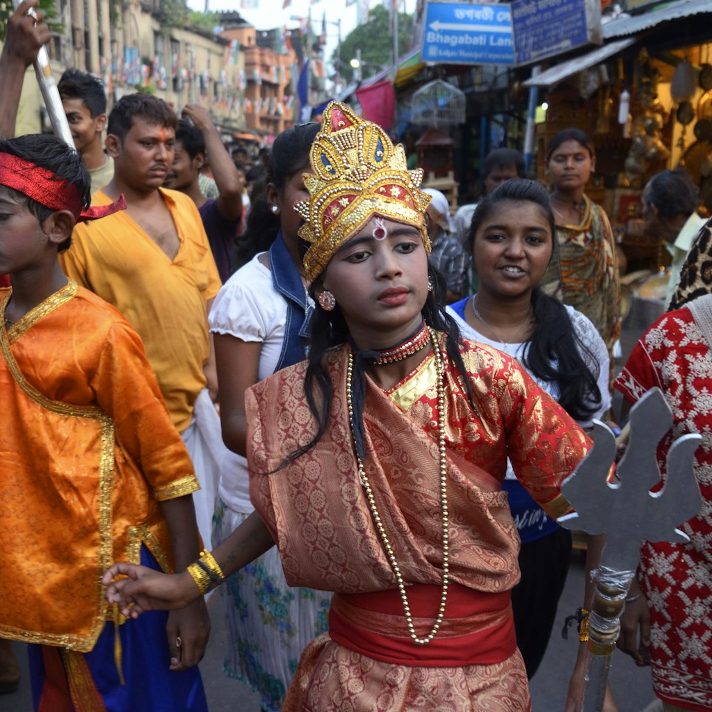 KOLKATA, INDIA - 2015/04/17: On the evening of Chaitra Sankranti the last day of Bengali calendar resident of Kalighat dress up like Hindu deities popularly known as Sang (Pantomime ) for a procession in the surrounding of Kalighat Temple. (Photo by Saikat Paul/Pacific Press/LightRocket via Getty Images)