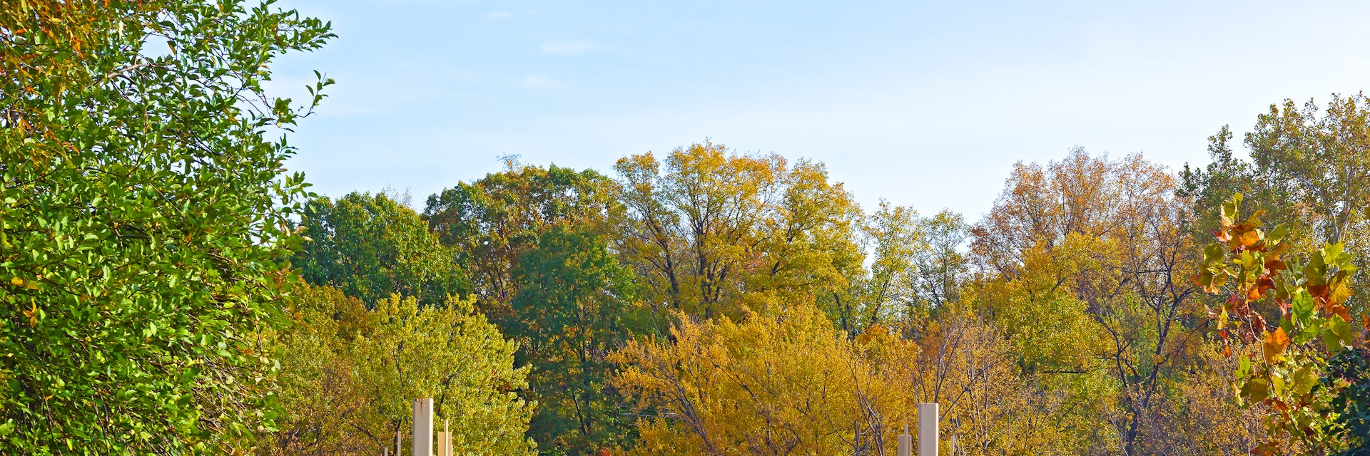 Theodore Roosevelt Island Park gates in fall.