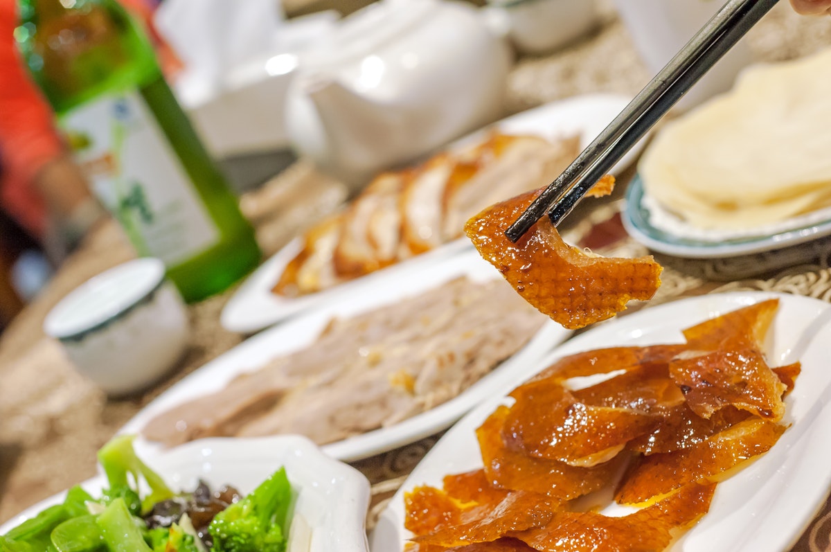 Eating roast duck at a Beijing roast duck restaurant
