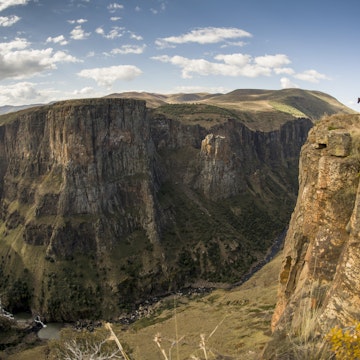 Two horsemen looking Maletsunyane Falls, Highlands, Lesotho