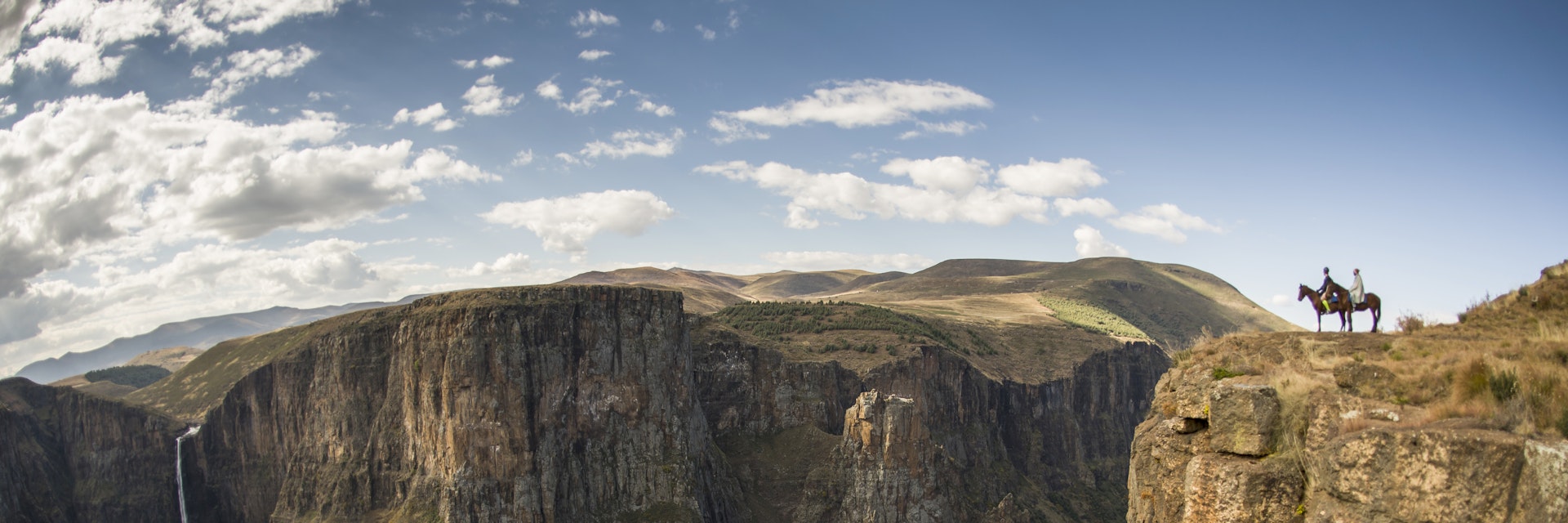 Two horsemen looking Maletsunyane Falls, Highlands, Lesotho