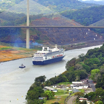 Cruise ship sailing underneath the Centennial Bridge, Panama Canal.