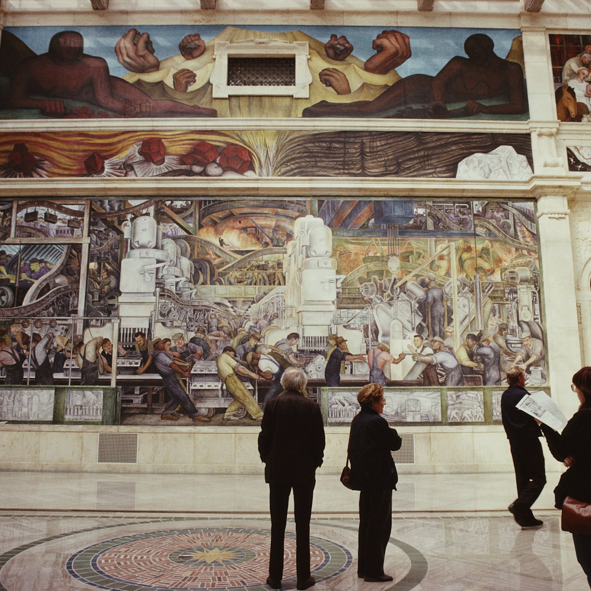 The North Wall of the Detroit Industry Murals, a series of frescoes by Mexican artist Diego Rivera at the Detroit Institute of Arts, Detroit, Michigan, October 1988. (Photo by Barbara Alper/Getty Images)